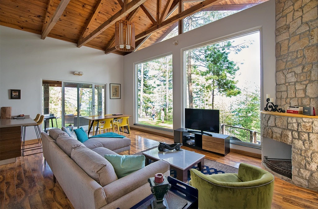 Aerial view of Blue Pine Mountain Homes luxury villa compound surrounded by pine forest in Galiyat, Pakistan